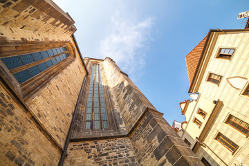 Fototapeta na wymiar Old street in Prague, view from the bottom up