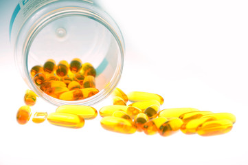 Yellow pills pour out of the can. Close-up. Coronavirus. Saving lives. Healthy lifestyle....