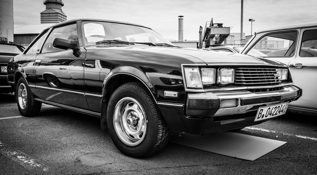 BERLIN, GERMANY - MAY 17, 2014: A compact sports car Toyota Celica Liftback (Third generation), 1983. Blacl and white. 27th Oldtimer Day Berlin - Brandenburg