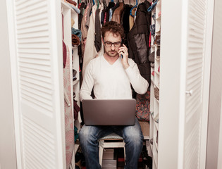 Very busy man, father working from home. Freelancer found a quiet place in a wadrobe for a self...