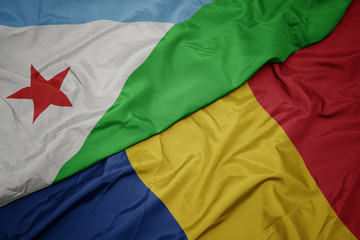 waving colorful flag of romania and national flag of djibouti.