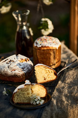 Traditional russian Easter cottage cheese dessert. Orthodox paskha, kulich cakes on table.