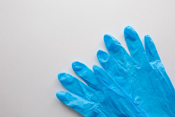 Blue medical gloves on a white background. Copy space. covid-19 protection. Coronavirus Epidemic