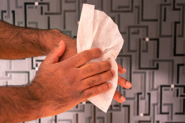 Cleaning hand with anti bacterial wipes