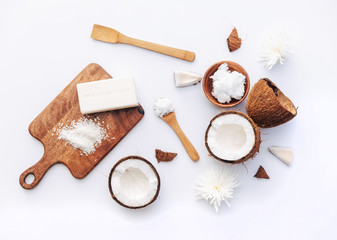 Fototapeta na wymiar Fresh Organic healthy coconut butter with coconut pieces over white background