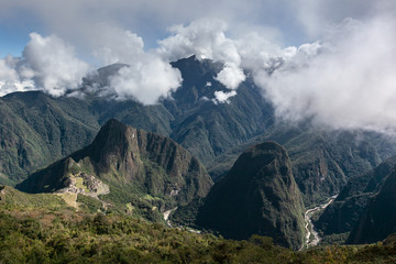 Machu Picchu surrounded by green hills Andean and urabamba river panorama from Montagna viewpoint