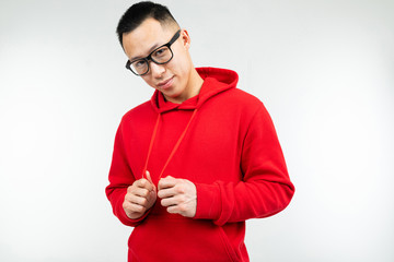 confident cool guy in glasses for vision poses on an isolated background with copy space