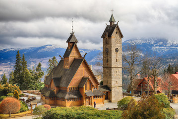 KARPACZ, POLAND - MARCH 09, 2020: Old wooden temple Vang (Wang). Medieval Norwegian stave church...