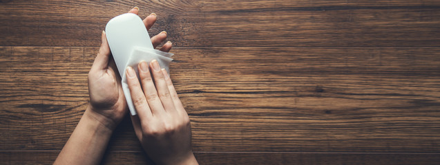 woman cleaning computer  mouse