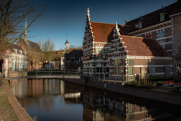 The Netherlands in winter with clear skies, buildings and streets
