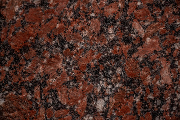 red marble background with gray and white splashes