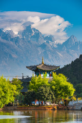 The black jade dragon snow mountain with a lot of cloud in Lijiang on China © Peerawat