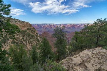 hiking the rim trail at the south rim of grand canyon in arizona, usa