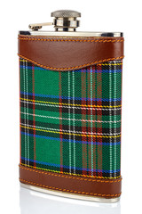 Classical scotland pewter hip flask with leather and tartan trim isolated on white background