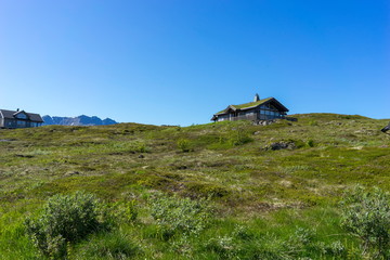 Fototapeta na wymiar Traditional houses in the mountains of Lofoten, Norway.