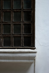 Fototapeta na wymiar Part of dark vintage window frame