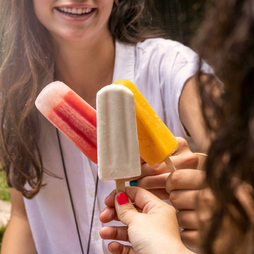 Young Woman Eating Ice Cream