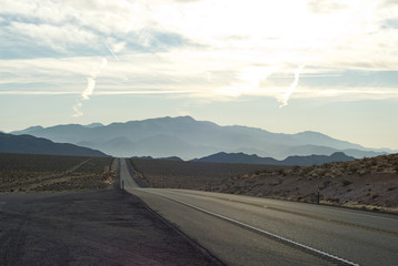 Highway 95 leading down the nevada desert towards Las Vegas.