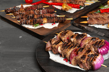Grilled meat skewers barbecue served on board. Kebab meat