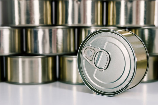 Close-up of a can with much more canned food stored at home to have enough food stored to use, for example, in times of quarantine by the Covid-19 Coronavirus.