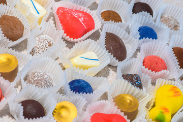 A lot of delicious multi-colored sweets. Close-up.