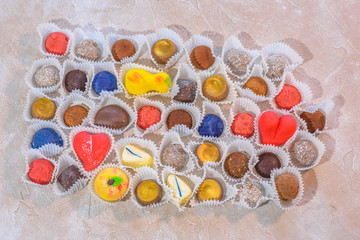 A lot of delicious multi-colored sweets. Close-up.