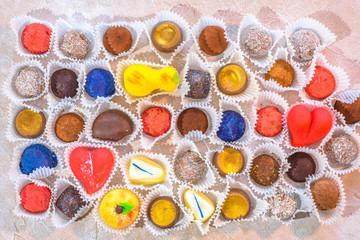 A lot of delicious multi-colored sweets. Close-up.