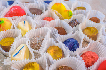 A lot of delicious multi-colored sweets. Close-up.