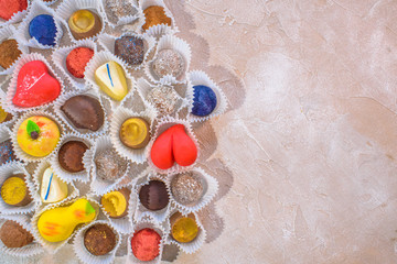 A lot of delicious multi-colored sweets. Close-up.