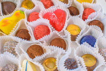 A lot of delicious multi-colored sweets. Close-up.
