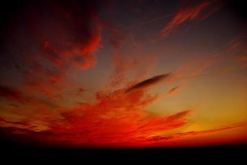 Beautiful red sky clouds at sunset wallpaper.
