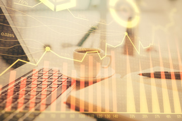 Double exposure of financial chart drawing and desktop with coffee and items on table background. Concept of forex market trading