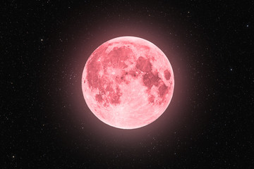 Pink full super moon glowing with pink halo surrounded by stars on black sky background - obrazy, fototapety, plakaty