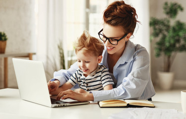 Mother and son working on remote project together