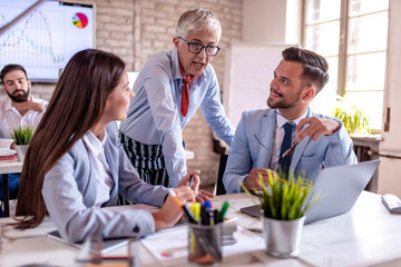 Business people are working together in modern office.