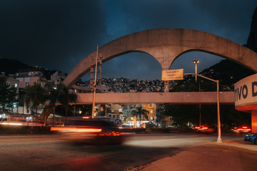 pedestrian bridge that leads to the Rocinha favela, Rio de Janeiro, Brazil at night