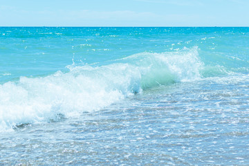 Blue water surface with wave.