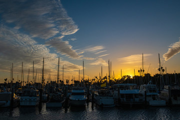 Sunset At A Boat Marina With Clouds