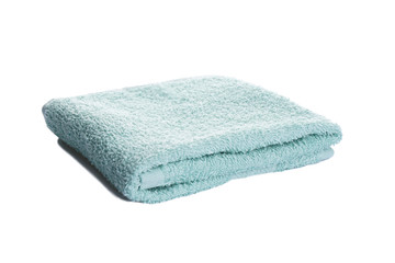 Bath accessories. Hygiene products. Green bath towel isolated on a white background.