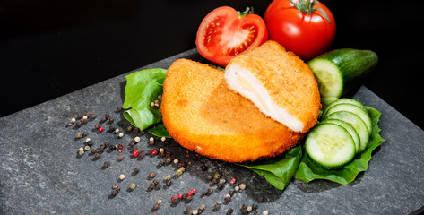 Cordon bleu chicken on salad