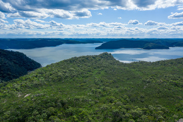 Aerial view of hills, forest and river
