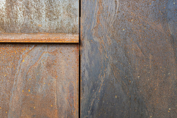 A close view of rusting metal plates, ideal backdrop, copyspace.