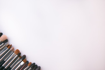 Makeup brushes set on white background