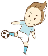 サッカーをする少年　シュート