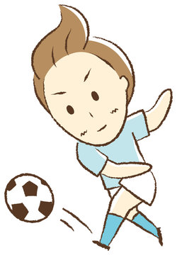 サッカーをする少年　シュート