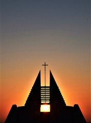 sunset over the church