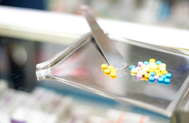Tray of medicine and medicine pack preparing for patient at drug store.