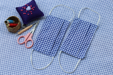 Washing DIY fabric face masks for reuse to protect from covid-19 pandemic situation in Thailand.