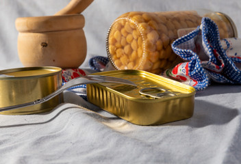 still life composition of canned food cans