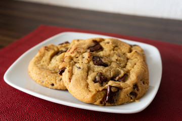 Tasty  chocolate chip  cookies on a plate